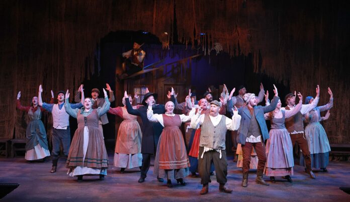 The villagers of Anatevka sing “Tradition” in “Fiddler on the Roof,” now on stage at Beef & Boards Dinner Theatre through Nov. 24. (Photo provided/Beef & Boards Dinner Theatre)