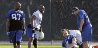 Reggie Wayne, Robert Mathis and Dallas Clark of the Indianapolis Colts