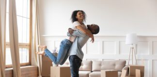Getty Image of couple hugging. Used for affordable housing story.