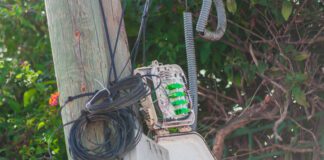 An opened sealed plastic installation box for bringing high-speed Internet to the residents' home. Technological connection nodes in communications.