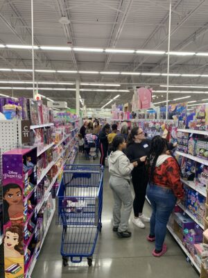 student from DREAM Alive shopping