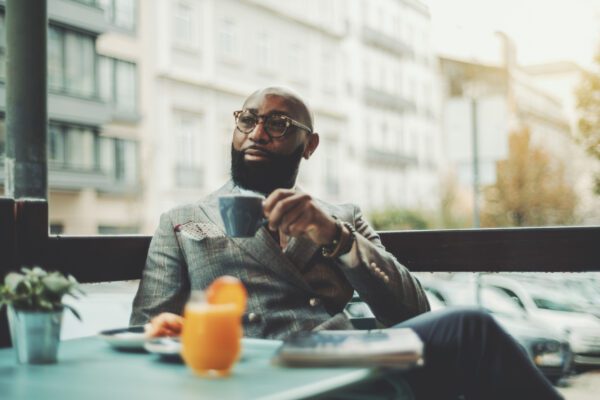 Black man in a suit.