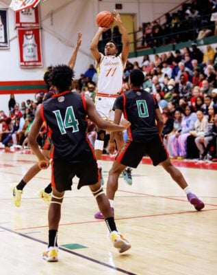 Liberty Christian High School basketball player shooting a jump shot.