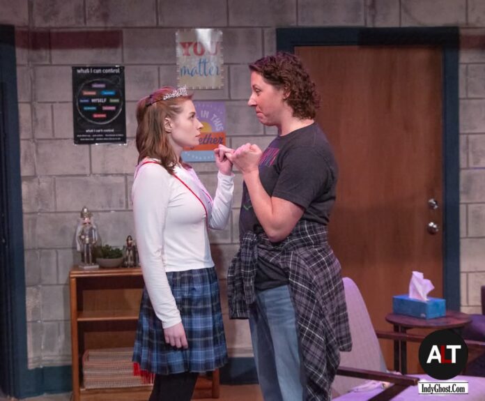 Cass and Molly swear JBG American Lives Theatre's production of "The JonBenét Game" by Tori Keenan-Zelt is onstage at the Basile Theatre now through Jan. 26, 2025. (Photo/Indy Ghost Light