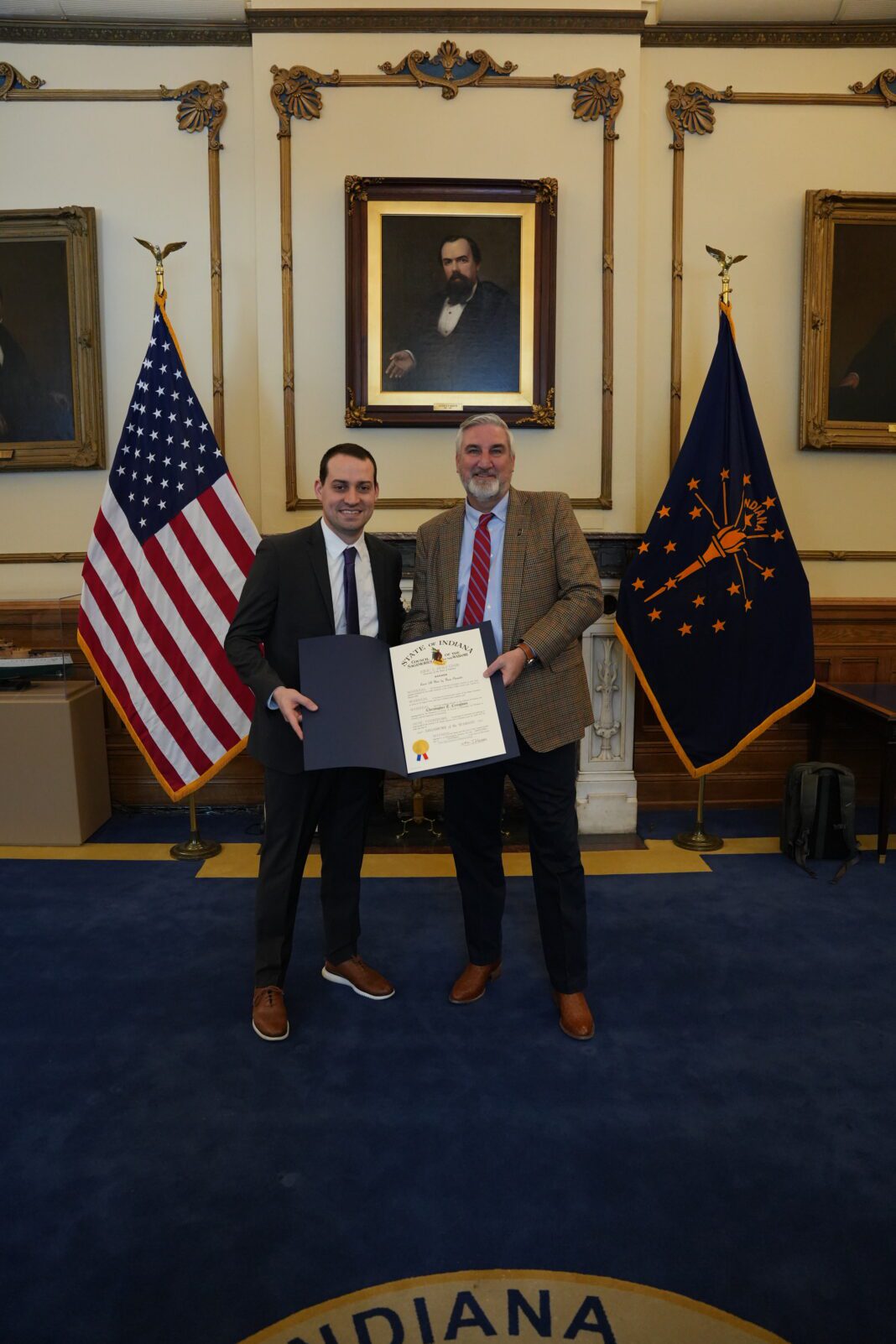 man receives award from governor
