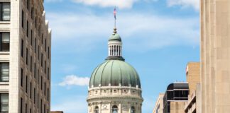 The Indiana Statehouse capitol building with blue sky behind. Indiana, USA.