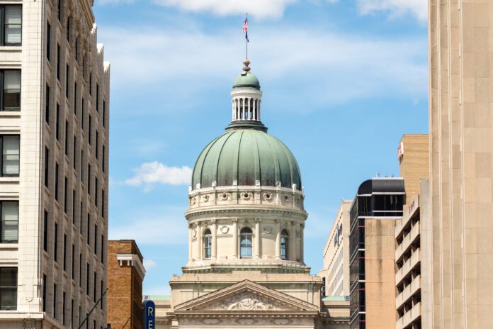 Indiana Statehouse The Indiana Statehouse capitol building with blue sky behind. Indiana, USA.