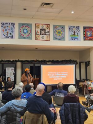 Indy Peace giving presentation about how they will prevent gun violence in Indy