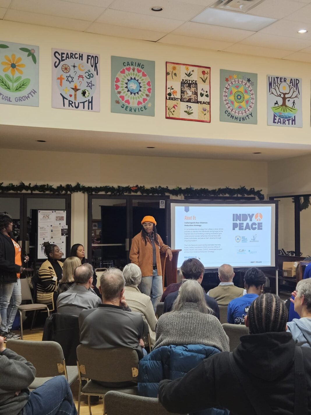 Indy Peace giving presentation about how they will prevent gun violence in Indy