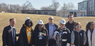 Many community members, including members of the Mayor's Office, MLK Center, Indy Steelers, Indy Parks and Recreation with shovels and hardhats during the groundbreaking of Richard Coach Nell Hamilton Field at Tarkington Park.