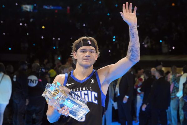 Mac McClung holding the Slam Dunk Trophy after 2025 NBA All-Star Saturday Night.