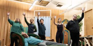 The cast in rehearsal for the Indiana Repertory Theatre's 2025 production of "The Play That Goes Wrong."(Photo/Noelani Langille)