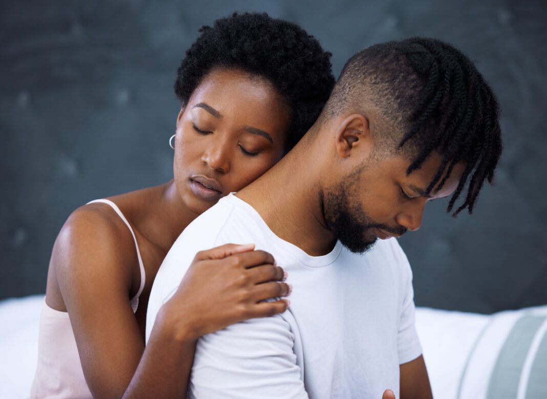 Getty Images of people hugging, used decoratively for Trauma editorial by Noral Parham 2025.