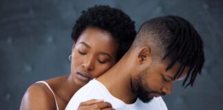 Getty Images of people hugging, used decoratively for Trauma editorial by Noral Parham 2025.