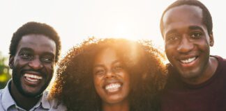 Black people smiling.