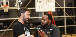 Senior Sports Reporter and founder of Horsemen Sports Media Noral Parham (Right) and Executive Director of The City League Austin Taylor speaking about the Granddaddy Dust Bowl Tournament, happening during the 2025 season of the Indiana State Fair. (Photo/David Dixon)