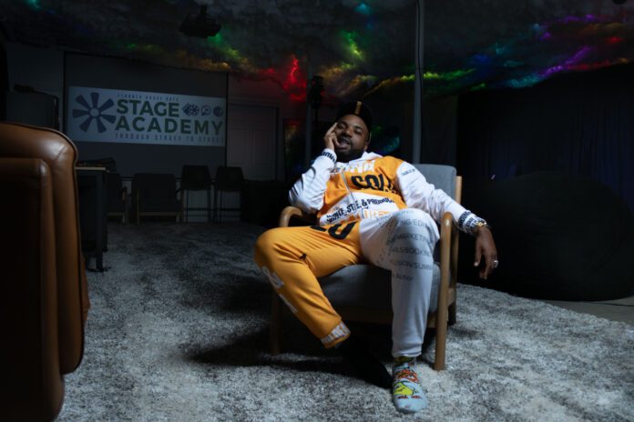 Dr. Austin Dean Ashford, the inaugural artistic director of Flanner House Arts, runs Cloud Underground, an intimate studio space where young creatives can work on their writing and music for free. (Photo/Mia Moore)