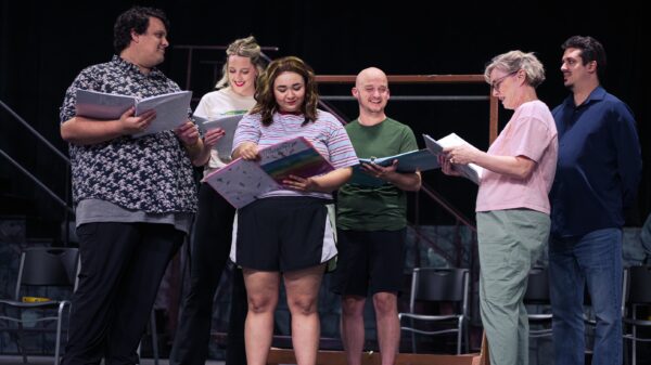 L to R: Sam Godsey, Abigail Okerson, Mara Fowler, Dustin Branum, Karen Frye, and Isaac Becker-Chamberlin rehearsing a scene for the upcoming production of “The Prom” at Footlite Musicals. (Photo provided/Footlite Musicals)