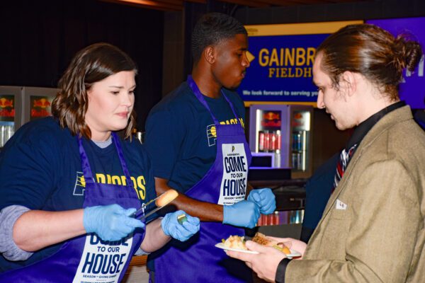 Pacers Sports & Entertainment (PS&E) Community event, feeding members of the Indianapolis community, in November of 2025 at Gainbridge Fieldhouse. Photo taken by Tiffany Nmose.