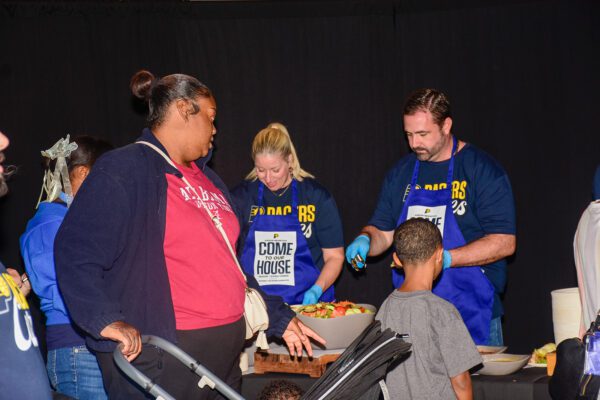 Pacers Sports & Entertainment (PS&E) Community event, feeding members of the Indianapolis community, in November of 2025 at Gainbridge Fieldhouse. Photo taken by Tiffany Nmose.