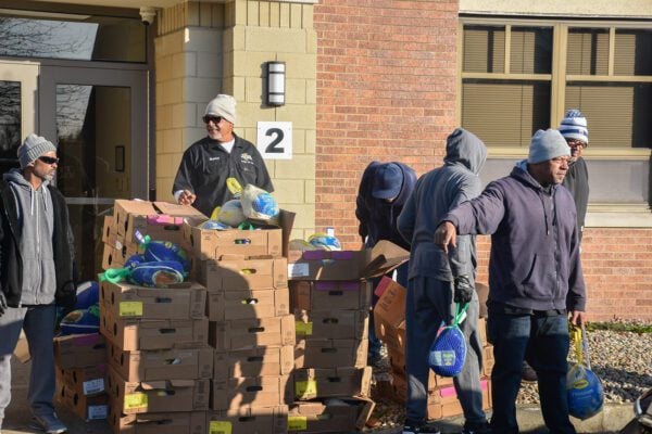 Holy Angels Catholic Church and School in Indianapolis, Indiana giving out holiday meals and turkeys to the community for 2025 Thanksgiving.