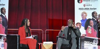 Deion Sanders with moderator Olivia West during the 2023-24 Steward Speakers event. (Photo provided/Matthew Steward)