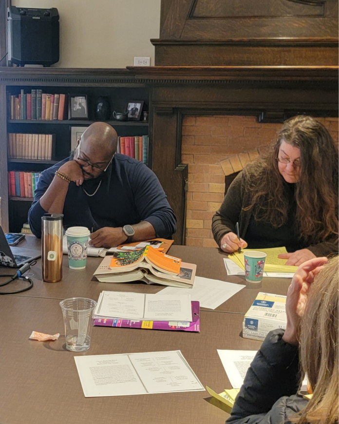 Poet and professor Thomas Kneeland facilitated the first Butler MFA Community Workshop of 2026 featuring 16 adult writers participating, including Tanya Gick, at Indiana Humanities. (Photo/Butler MFA)
