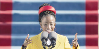 American poet Amanda Gorman reads a poem during the 59th Presidential Inauguration at the U.S. Capitol in Washington, Wednesday, Jan. 20, 2021. (AP Photo/Patrick Semansky, Pool)