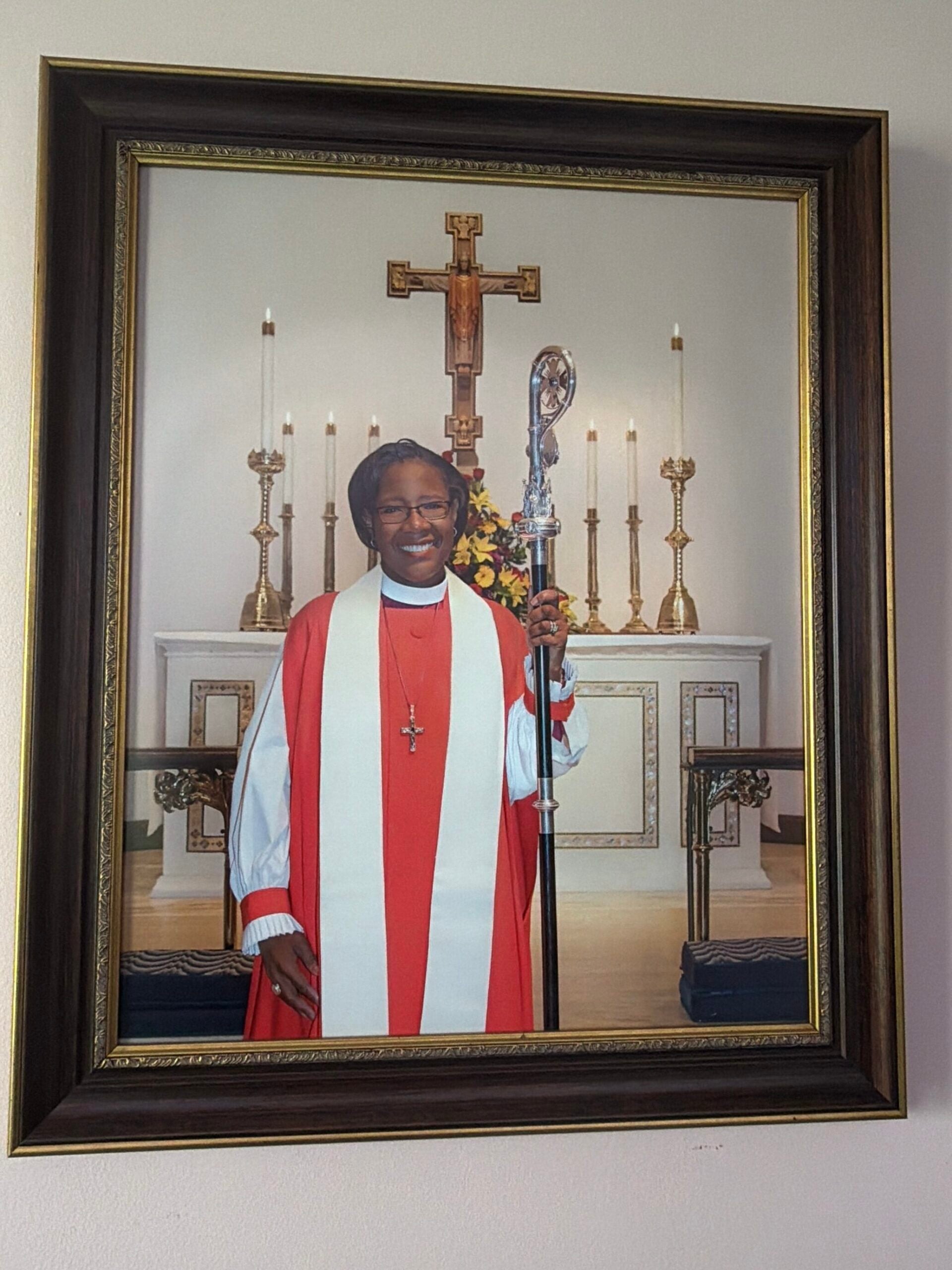 A framed photo of Bishop Jennifer Baskerville Burrows hangs in the hallway of St. Philip’s Episcopal Church in Indianapolis. (Photo/Camike Jones)