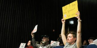 Residents opposed to a proposed data center in Martindale-Brightwood attend a City-County Council meeting Monday, May 4, 2026 where the council approved Metrobloks' rezoning request. (Photo/WFYI)