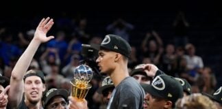 San Antonio Spurs forward Victor Wembanyama holds the MVP trophy as he celebrates with teammates after Game 7 of the Western Conference finals of the NBA basketball playoffs series win against the Oklahoma City Thunder, Saturday, May 30, 2026, in Oklahoma City. (AP Photo/Tony Gutierrez)