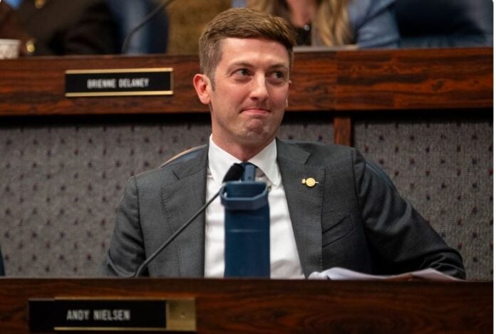 Councilor Andy Nielsen, D-District 14, reacts after councilors voted to override Mayor Joe Hogsett’s veto of a proposal to increase vehicle registration taxes to pay for road repairs during a City-County Council meeting Aug. 10, 2026, at the City-County Building in Indianapolis. Credit: Brett Phelps/Mirror Indy/CatchLight Local/Report for America