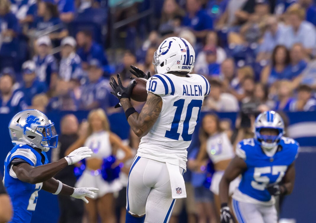 Indianapolis Colts wide receiver Keenan Allen (#10), reaches up to secure a reception during on-field action with Detroit Lions defenders nearby on Aug. 29, 2026, at Lucas Oil Stadium, in downtown Indianapolis, Indiana. (Photo/Walt Thomas)