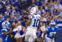 Indianapolis Colts wide receiver Keenan Allen (#10), reaches up to secure a reception during on-field action with Detroit Lions defenders nearby on Aug. 29, 2026, at Lucas Oil Stadium, in downtown Indianapolis, Indiana. (Photo/Walt Thomas)