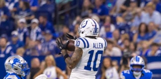 Indianapolis Colts wide receiver Keenan Allen (#10), reaches up to secure a reception during on-field action with Detroit Lions defenders nearby on Aug. 29, 2026, at Lucas Oil Stadium, in downtown Indianapolis, Indiana. (Photo/Walt Thomas)