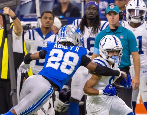 An Indianapolis Colts player advances the football while being tackled by a Detroit Lions defender, #28, Keith Abney II, during the game on Aug. 29, 2026, at Lucas Oil Stadium, in downtown Indianapolis, Indiana. (Photo/Walt Thomas)