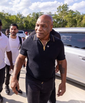 Former heavyweight boxing champion Mike Tyson arrives at the facility to take part in community festival weekend festivities organized by comedian and Indianapolis native Mike Epps on Aug. 28, 2026, at The Right Jab boxing gym, located at 3737 Sutherland Ave, in Indianapolis. (Photo/Walt Thomas)