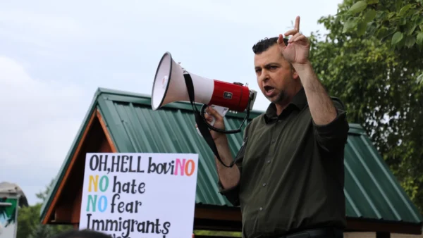 Indiana State Sen. Fady Qaddoura (D-Indianapolis) giving a speech Aug. 1, 2026 at a pro-immigration event in Fishers.