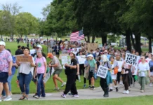 Hundreds marched in support of immigrants Aug. 1, 2026 in Fishers, largely framed as a counter-event to a pro-mass deportation rally happening nearby.