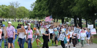 Hundreds marched in support of immigrants Aug. 1, 2026 in Fishers, largely framed as a counter-event to a pro-mass deportation rally happening nearby.