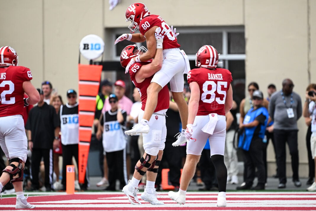 BLOOMINGTON, IN - SEPTEMBER 12: Indiana Hoosiers OL Carter Smith (65) lifts Indiana Hoosiers WR Charlie Becker (80) into the air while celebrating a touchdown during a college football game between the Howard Bison and Indiana Hoosiers on September 12, 2026 at Memorial Stadium in Bloomington, IN. (Photo by James Black/Icon Sportswire) (Icon Sportswire via AP Images)