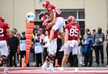 BLOOMINGTON, IN - SEPTEMBER 12: Indiana Hoosiers OL Carter Smith (65) lifts Indiana Hoosiers WR Charlie Becker (80) into the air while celebrating a touchdown during a college football game between the Howard Bison and Indiana Hoosiers on September 12, 2026 at Memorial Stadium in Bloomington, IN. (Photo by James Black/Icon Sportswire) (Icon Sportswire via AP Images)