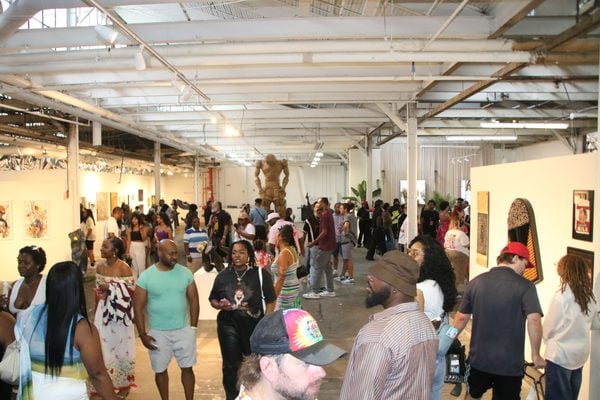 BUTTER 6: Art enthusiast meander through the gallery. Sept. 5, 2026 (Photo/Michael Patton)