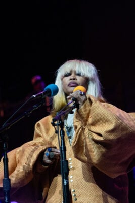 Erykah Badu looks out at the audience while performing her set on Sept. 22, 2026, at the Everwise Amphitheater at White River State Park, in Indianapolis, Indiana. (Photo/Mia Moore)