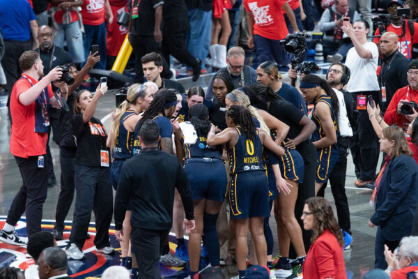 The Indiana Fever team in a huddle during Game 2 versus the Indiana Fever, on Sept. 29, 2026, at Gainbridge Fieldhouse, in downtown Indianapolis, Ind. (Photo/Mia Moore)