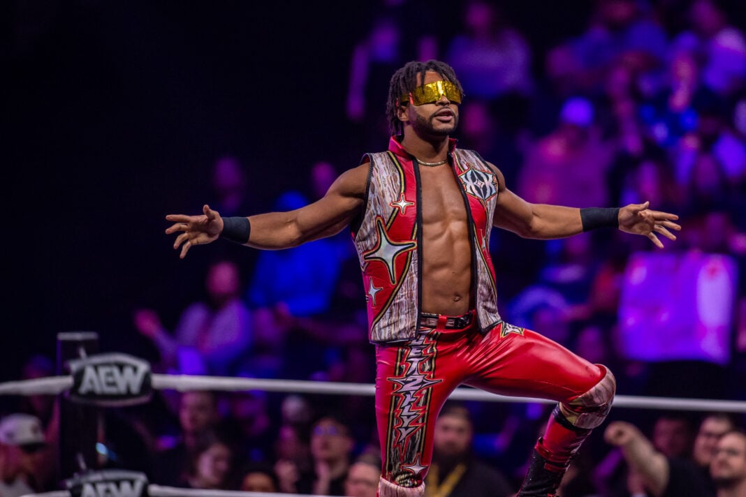 Isiah Kassidy, also known as Zay, poses for the crowd in his signature red and gold entrance gear during AEW Dynamite on Sept. 23, 2026, at the Fishers Event Center, in Fishers, Ind. (Photo/Josh Herd)
