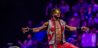 Isiah Kassidy, also known as Zay, poses for the crowd in his signature red and gold entrance gear during AEW Dynamite on Sept. 23, 2026, at the Fishers Event Center, in Fishers, Ind. (Photo/Josh Herd)