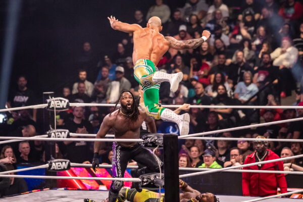 Ricochet leaps high into the air to execute a high-flying attack as Swerve Strickland looks on during AEW Dynamite on Sept. 23, 2026, at the Fishers Event Center, in Fishers, Ind. (Photo/Josh Herd)