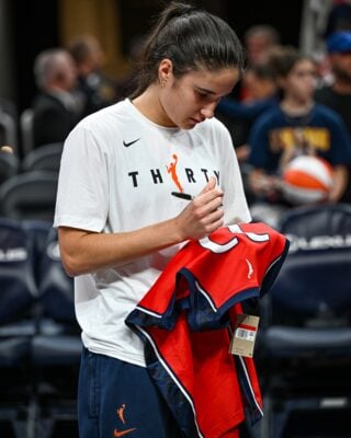 Washington Mystics guard Sonia Citron signs a fan's jersey during the pre-game of their contest against Indiana Fever, held on Sept. 20, 20026, in Indianapolis, IND. (Photo/Darnell Scott)
