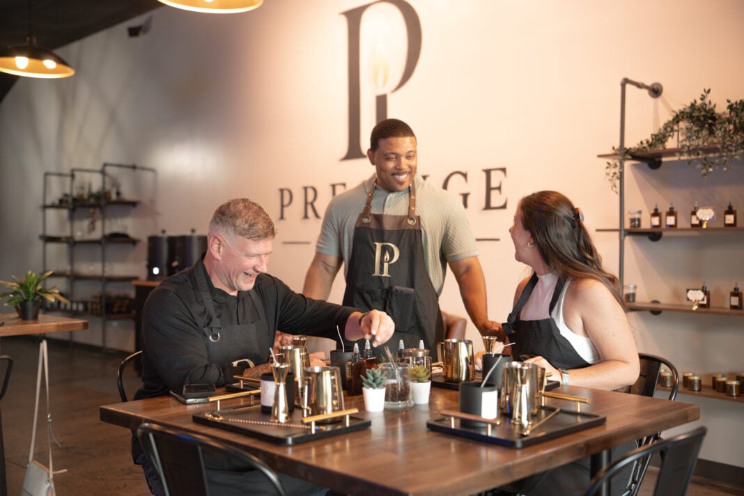 Grant Berry, and Indianapolis firefighter, celebrated the grand opening of Prestige Candle Co. on Aug. 22. (Photo provided/Grant Berry)